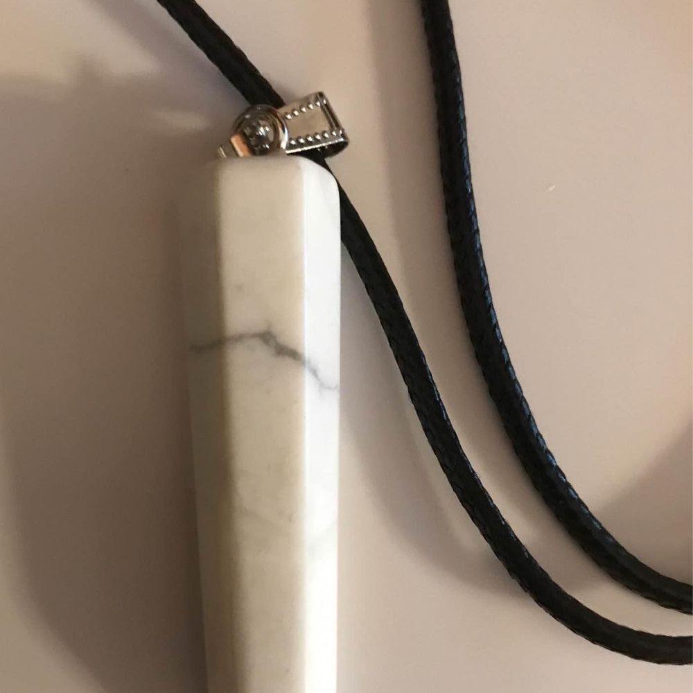White howlite crystal pendant on black cord chain necklace